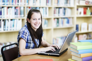 High school student in library High school student in library